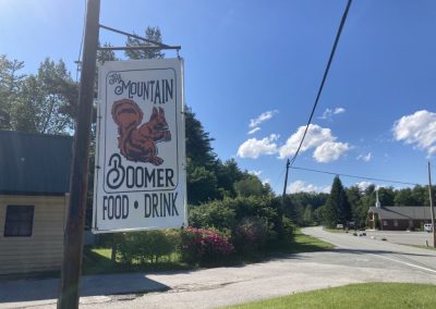 original sign out front replaced with wooden custom sign