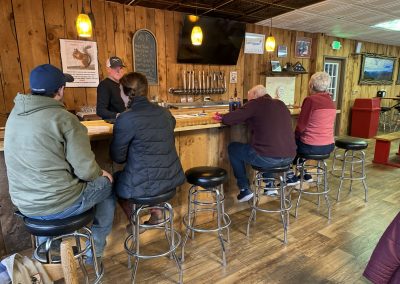 enjoying a cold beer at the mountain boomer bar