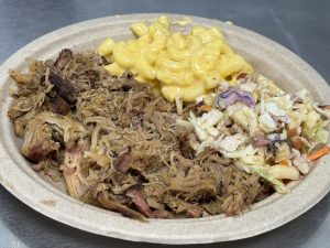 pulled pork plate with coleslaw and macaroni and cheese