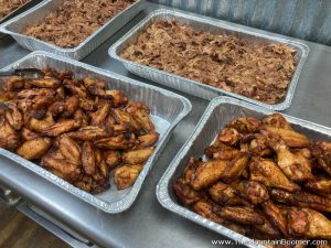 trays of smoked pork and chicken at mountain boomer