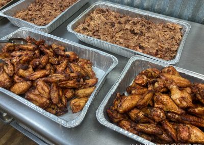 trays of smoked pork and chicken at mountain boomer